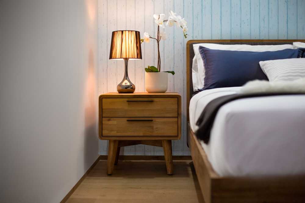 Contemporary Bedroom with Wood Flooring and Bedside Table