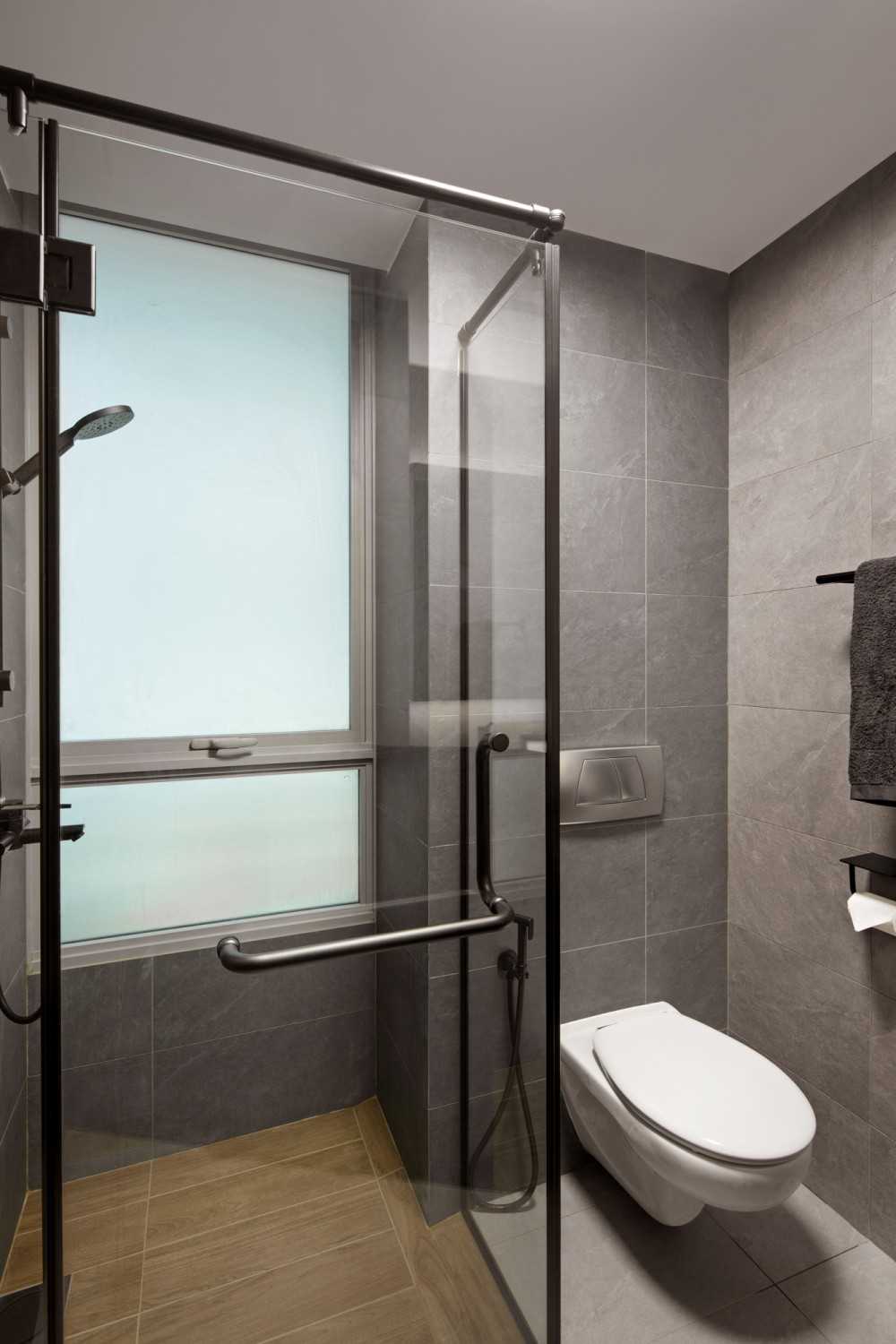 Contemporary Bathroom with Wood Flooring and Shower Screen