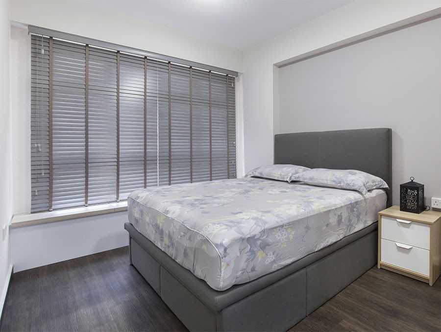 Modern Bedroom with Bay Window and Bedside Table