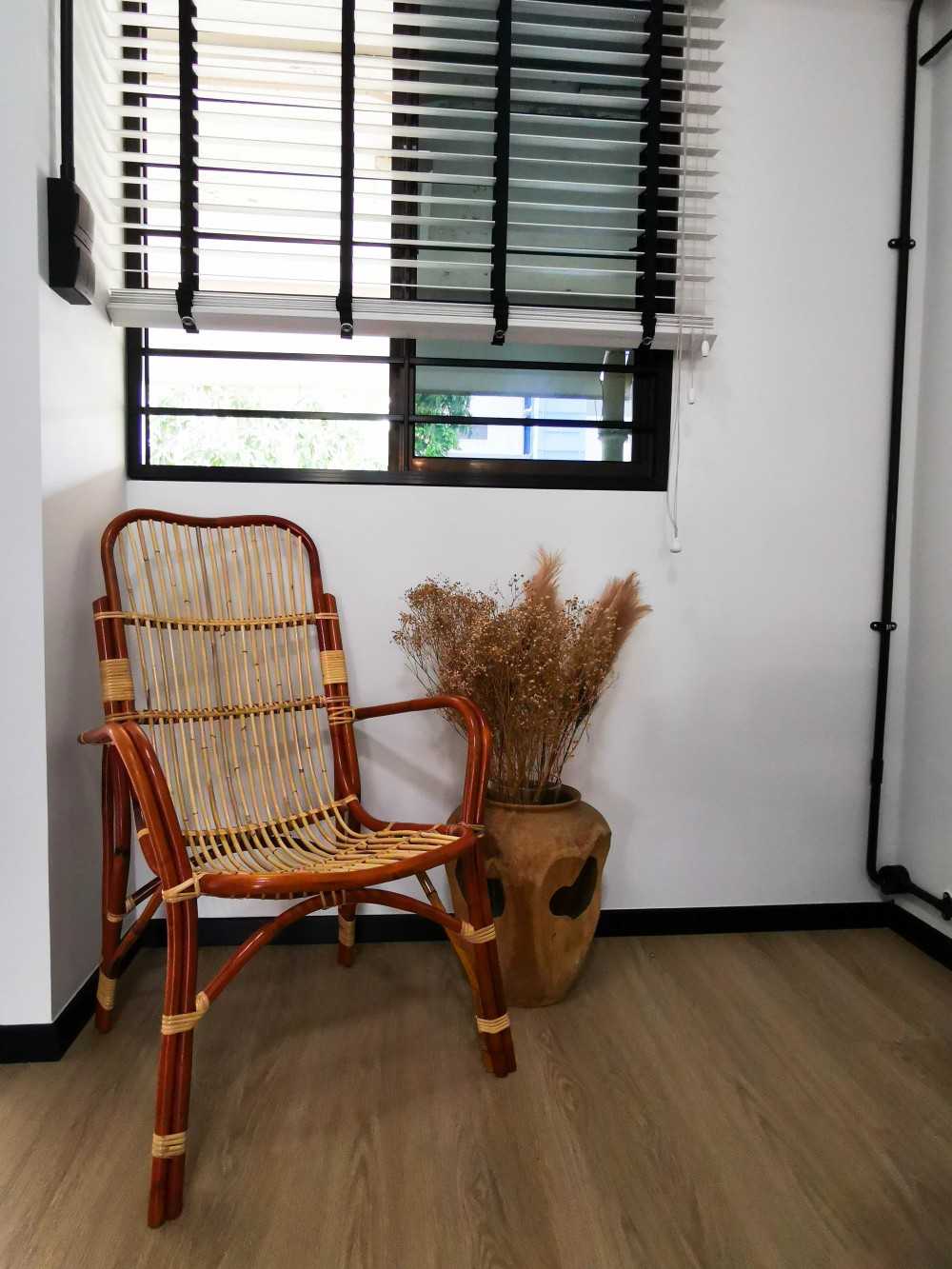 Industrial Entryway with Seating Bench and Houseplants