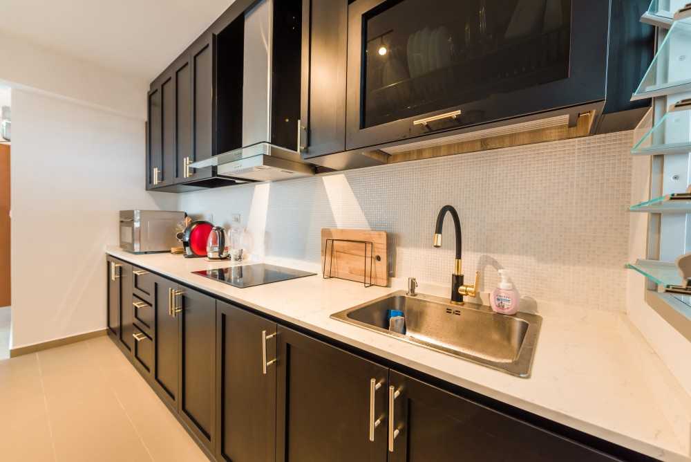 Country Kitchen with Countertop and Herringbone Tiling