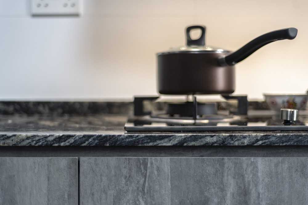 Industrial Kitchen with Countertop and Granite Floor