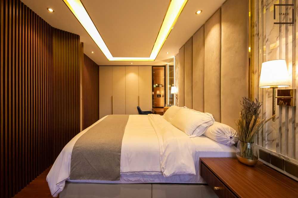 Modern Bedroom with Cove Lighting and Closet