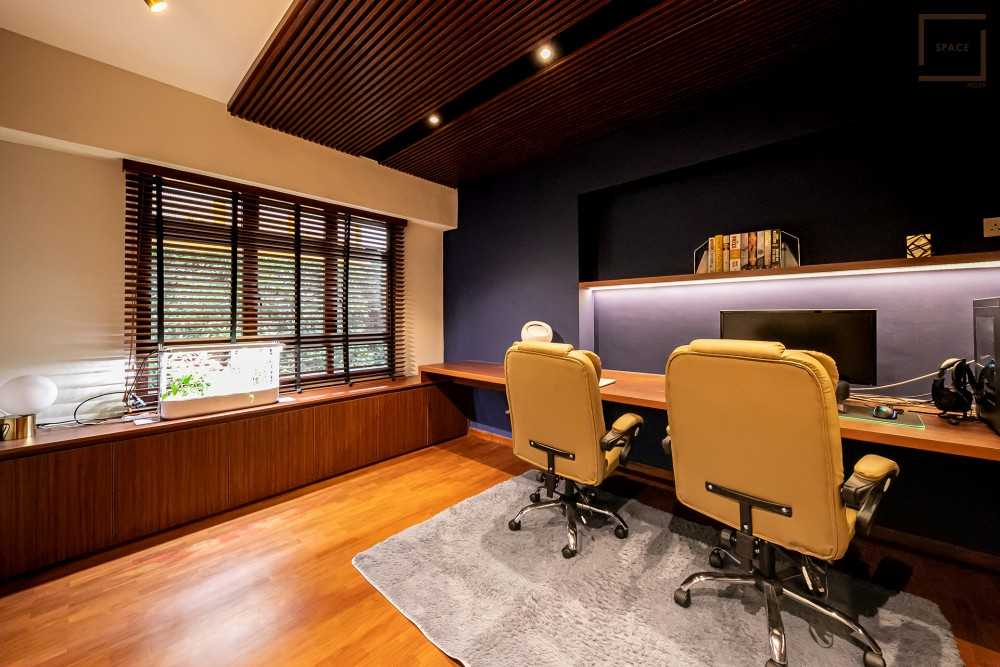 Modern Office with Bookshelf and Desk