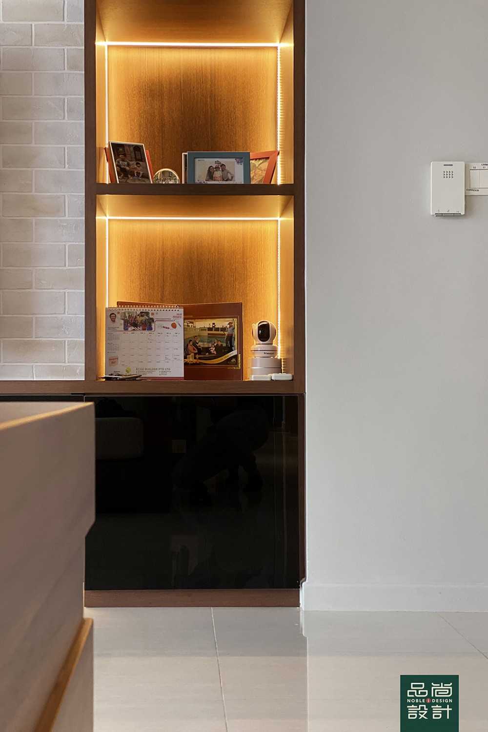Asian Living Room with Bookshelf and Homogeneous Tiles
