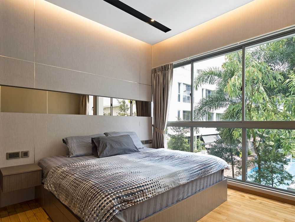 Modern Bedroom with Cove Lighting and Bedside Table