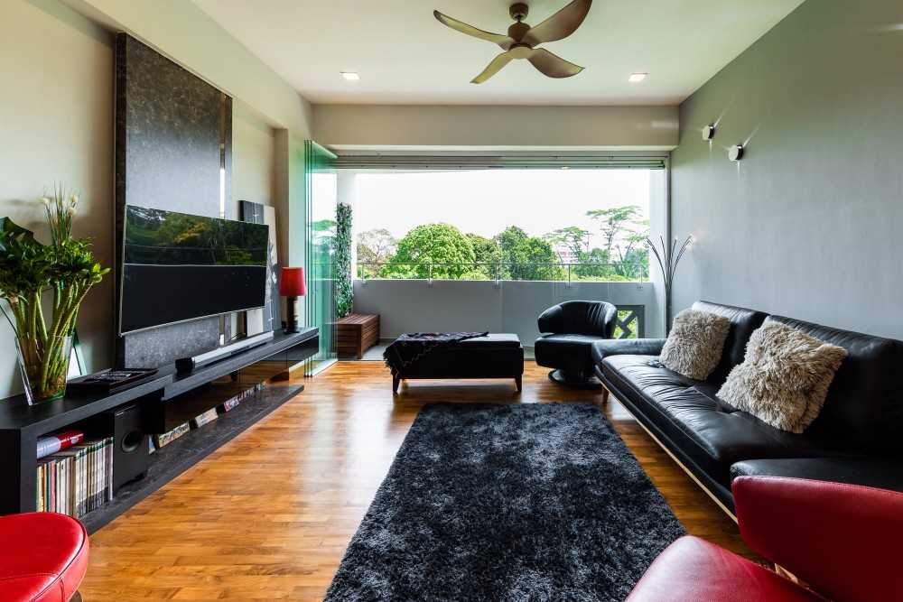 Asian Living Room with Wood Flooring and TV Console