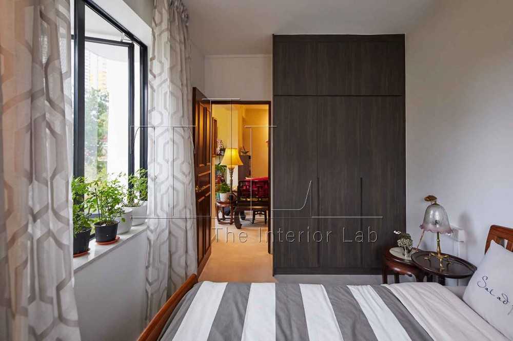 Asian Bedroom with Wardrobe and Bedside Table