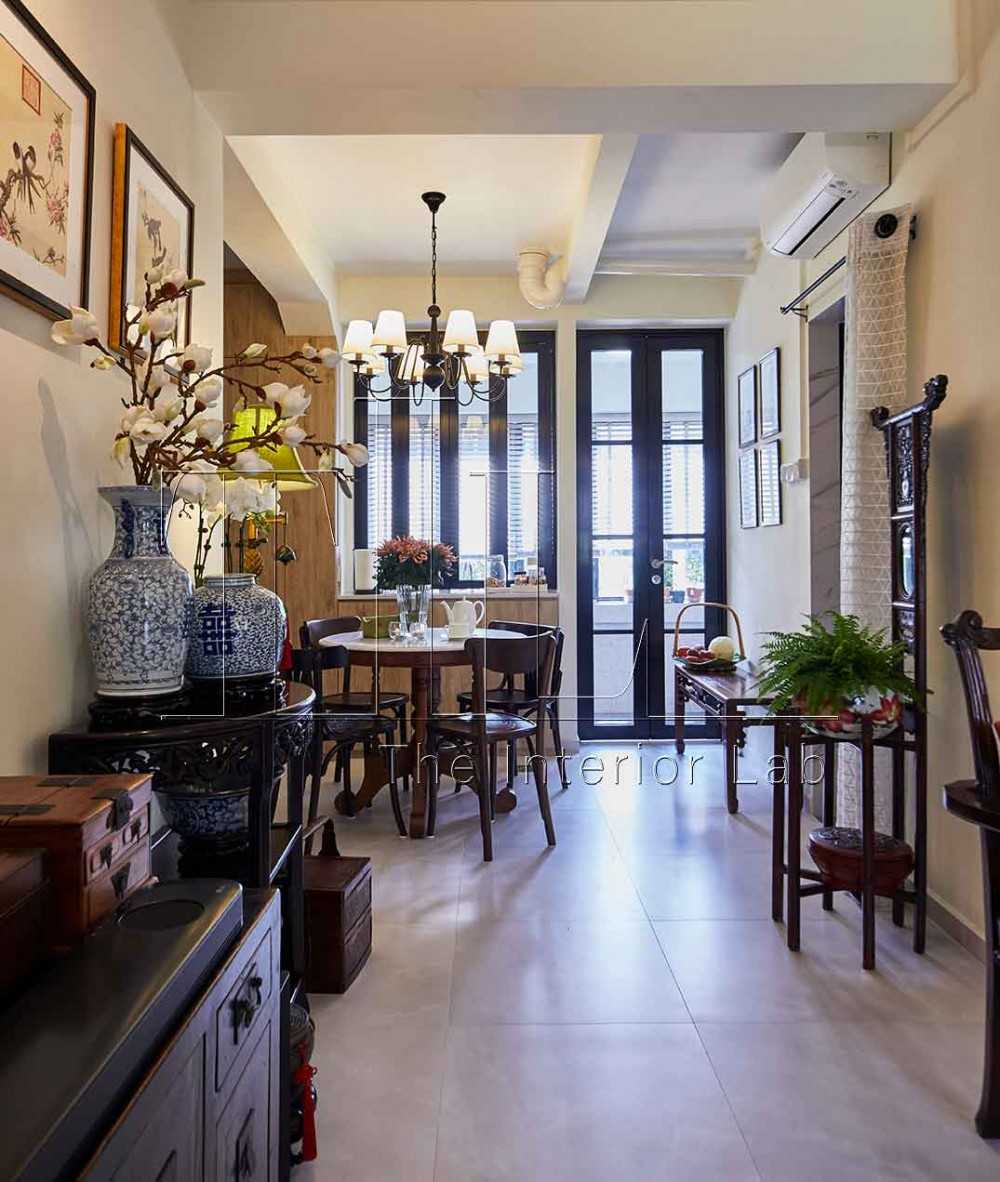 Asian Dining Room with Glass Door and Ceiling Light
