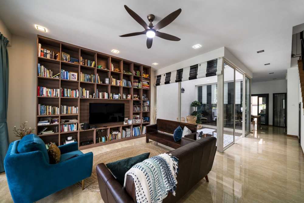 Modern Living Room with Bookshelf and Marble Floor