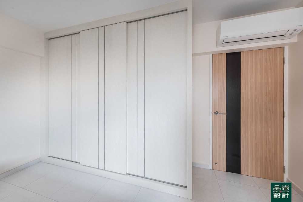 Modern Bedroom with Homogeneous Tiles and Wardrobe