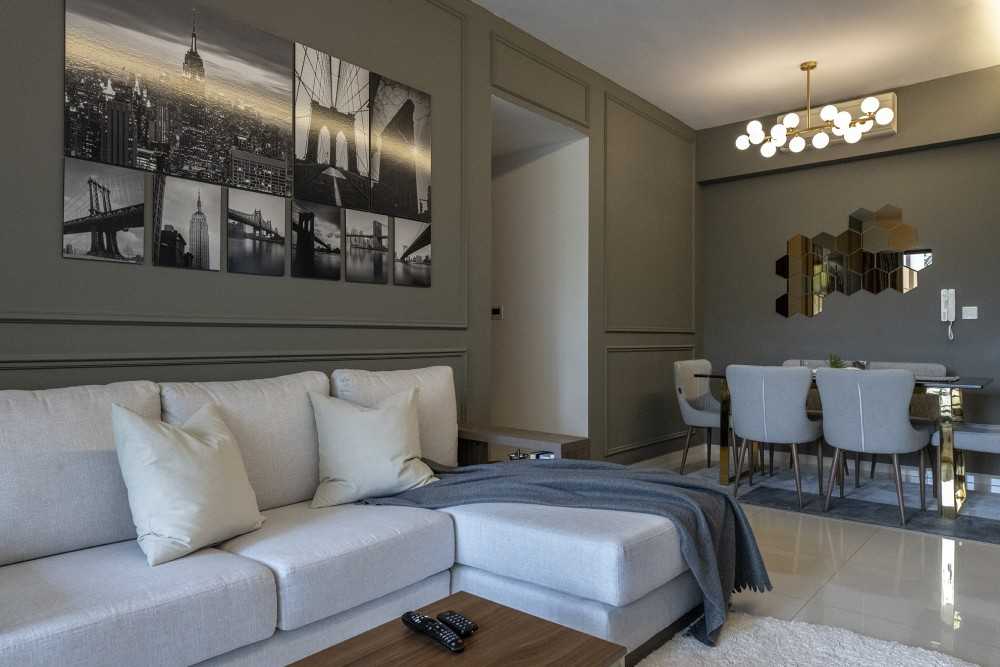 Modern Living Room with Homogeneous Tiles and Feature Wall