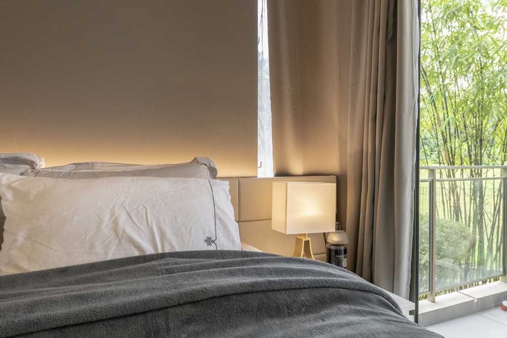 Modern Bedroom with Parquet Floor and Bedside Table