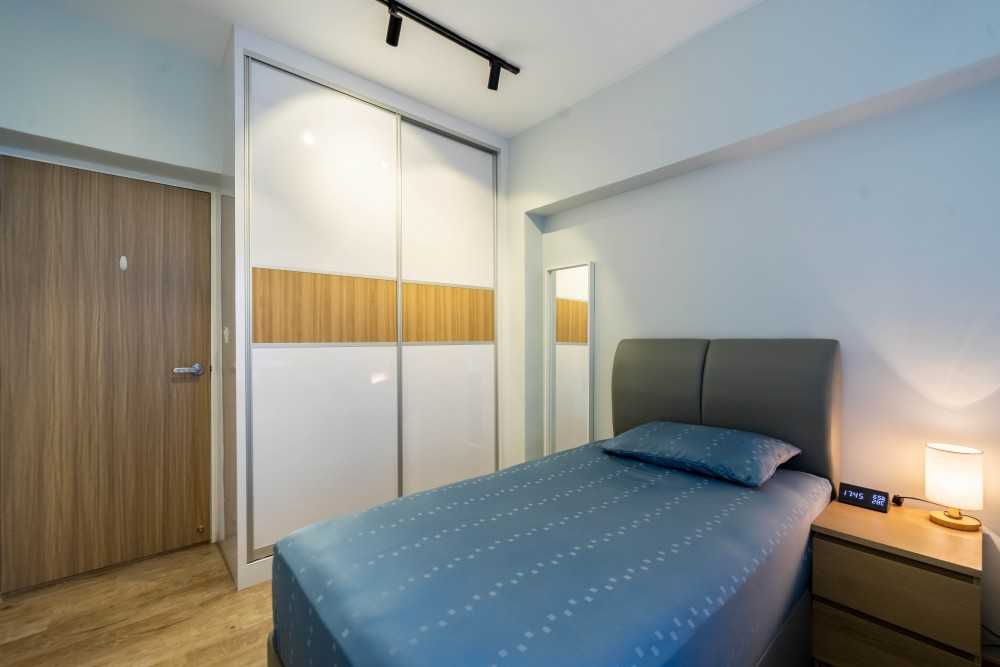 Contemporary Bedroom with Wood Flooring and Wardrobe