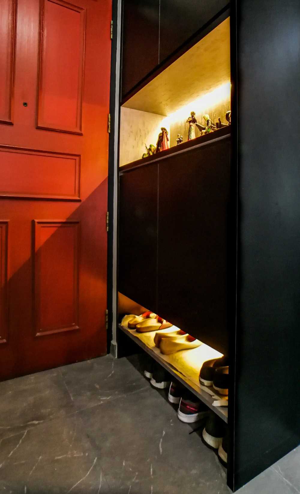 Scandinavian Entryway with Shoe Cabinets and Lighting