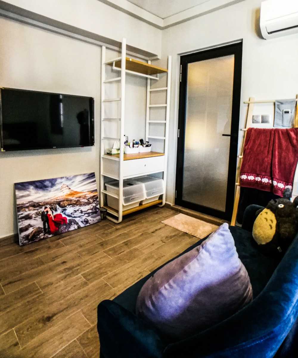 Scandinavian Gaming Room with Glass Door and Sofa