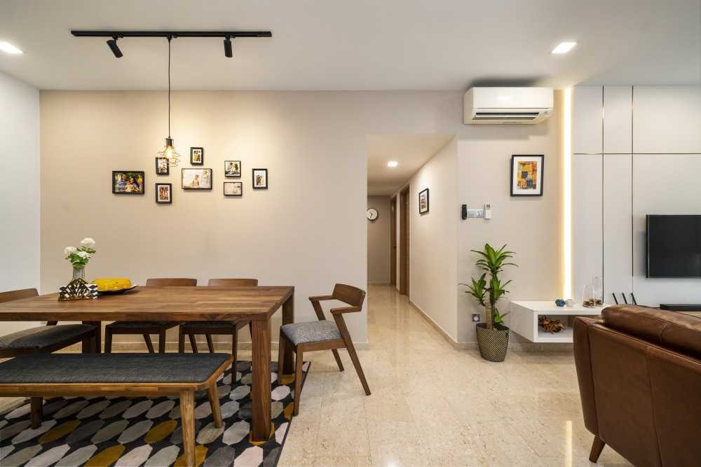 Minimalist Dining Room with Drop Light and Dining Table
