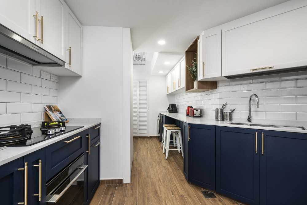Scandinavian Kitchen with Vinyl Flooring and Kitchen Island