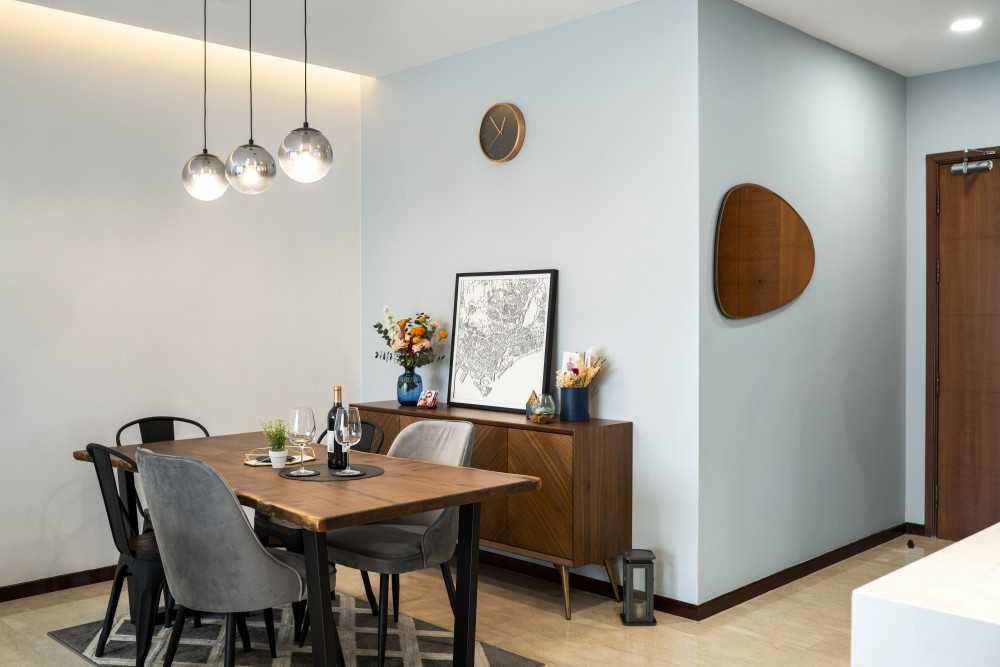 Scandinavian Dining Room with Drop Light and Dining Table