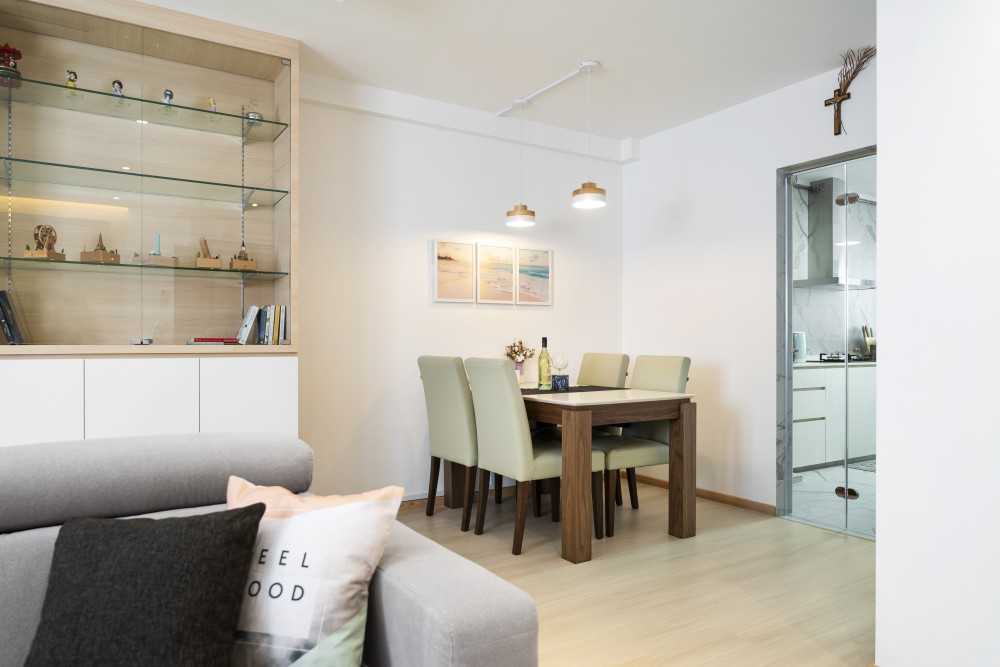 Minimalist Dining Room with Drop Light and Dining Table