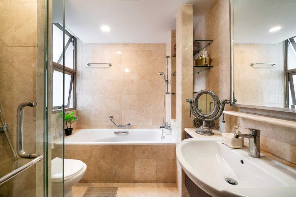 Asian Bathroom with Homogeneous Tiles and Bathtub