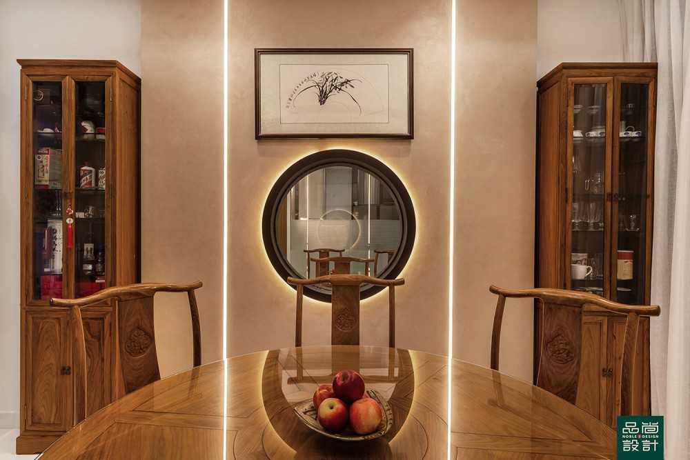 Asian Dining Room with Feature Wall and Mirror