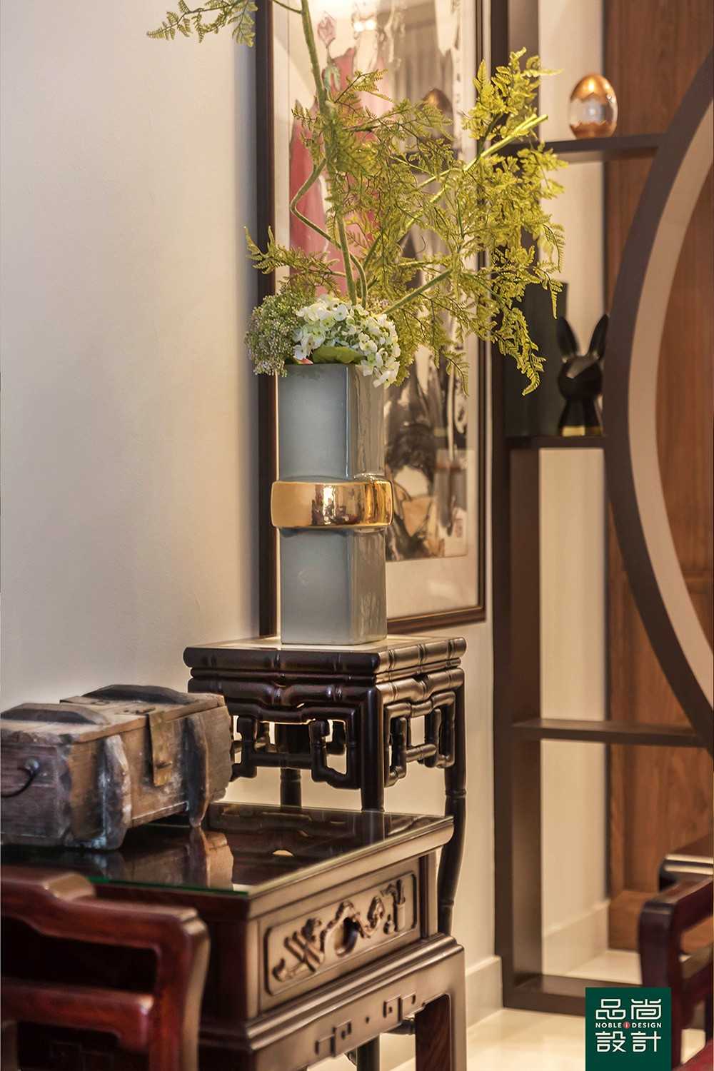 Asian Living Room with Paintings and Display Cabinets