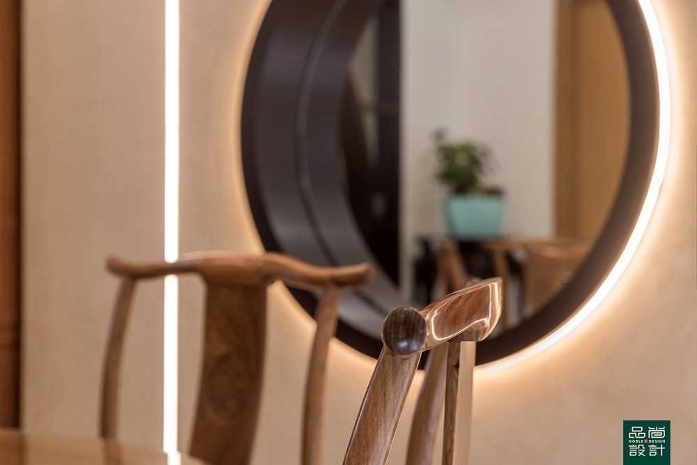 Asian Dining Room with Feature Wall and Mirror