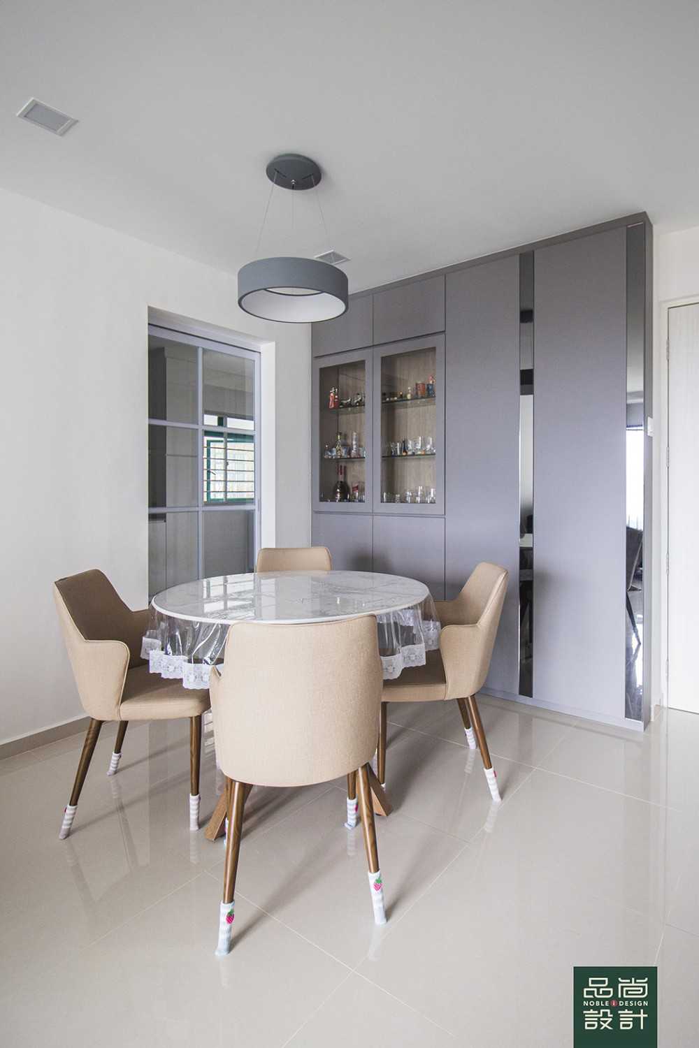 Modern Dining Room with Homogeneous Tiles and Storage Cabinets