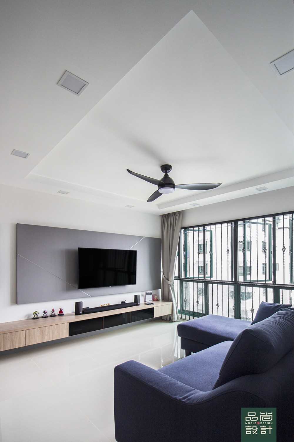 Modern Living Room with Homogeneous Tiles and TV Console