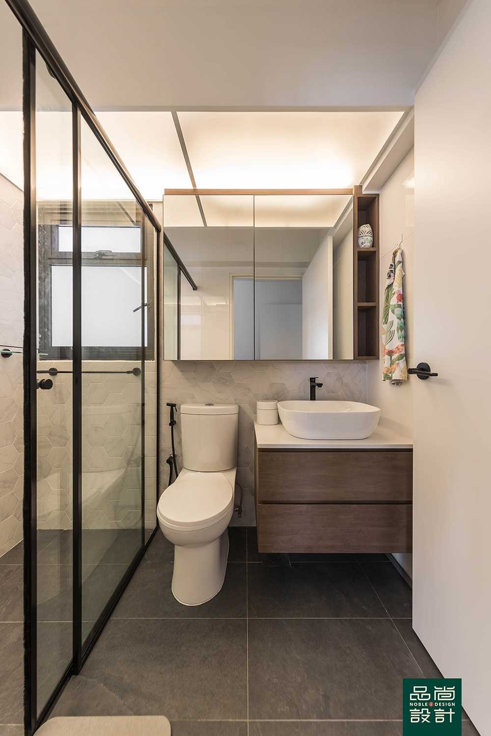 Modern Bathroom with Homogeneous Tiles and Mirror