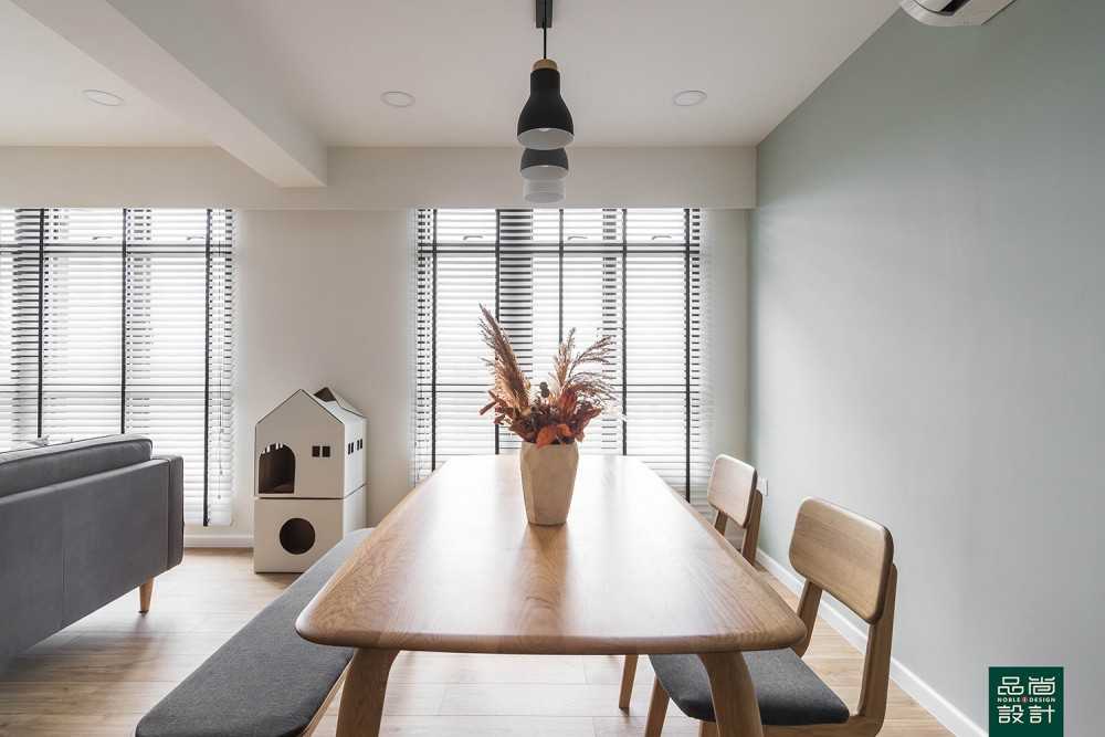 Modern Dining Room with Dining Table and Paintings