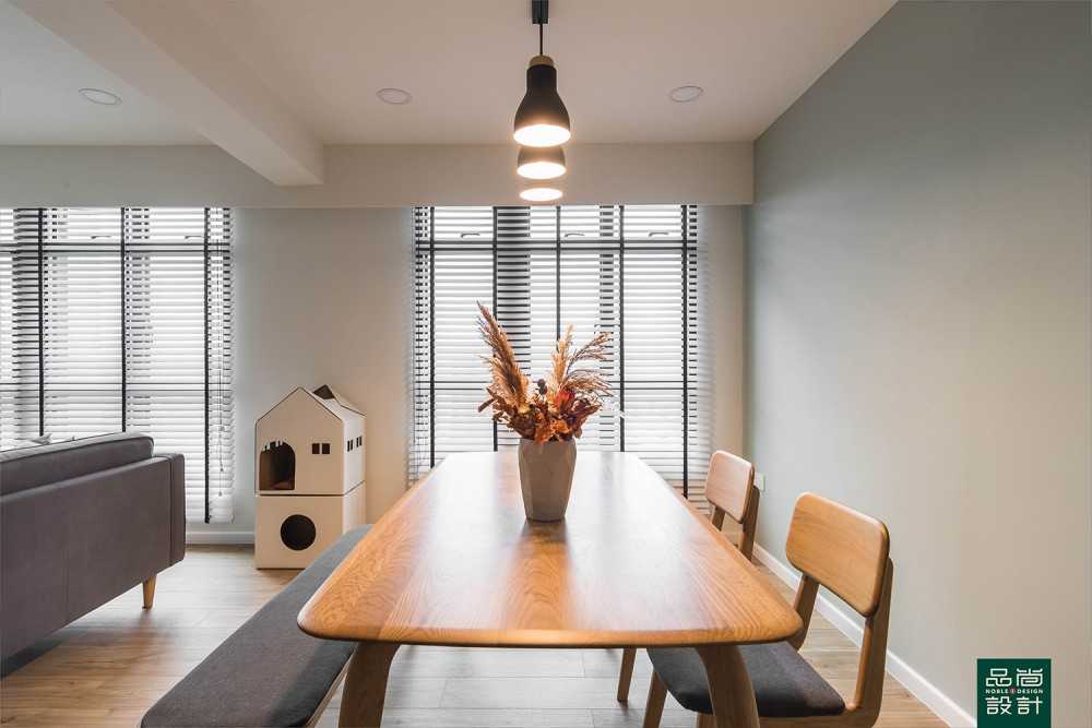 Modern Dining Room with Dining Table and Paintings