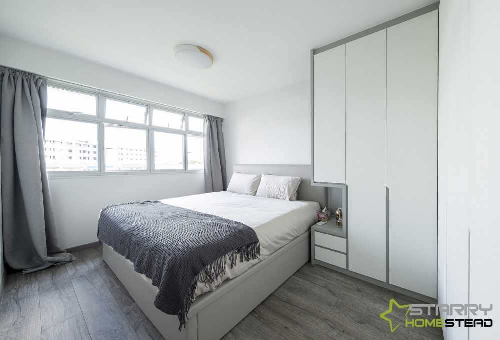 Scandinavian Bedroom with Wood Flooring and Wardrobe
