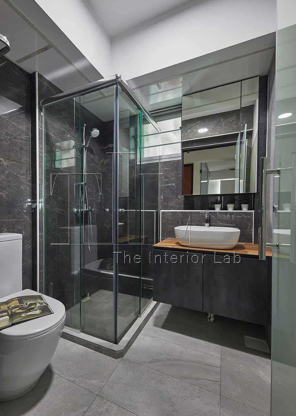 Industrial Bathroom with Marble Floor and Mirror