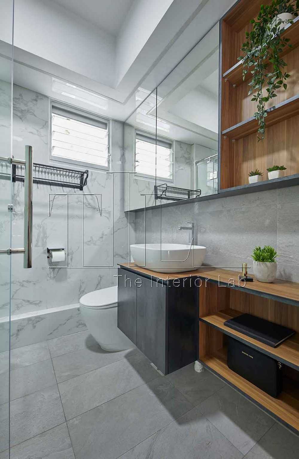 Industrial Bathroom with Marble Floor and Mirror