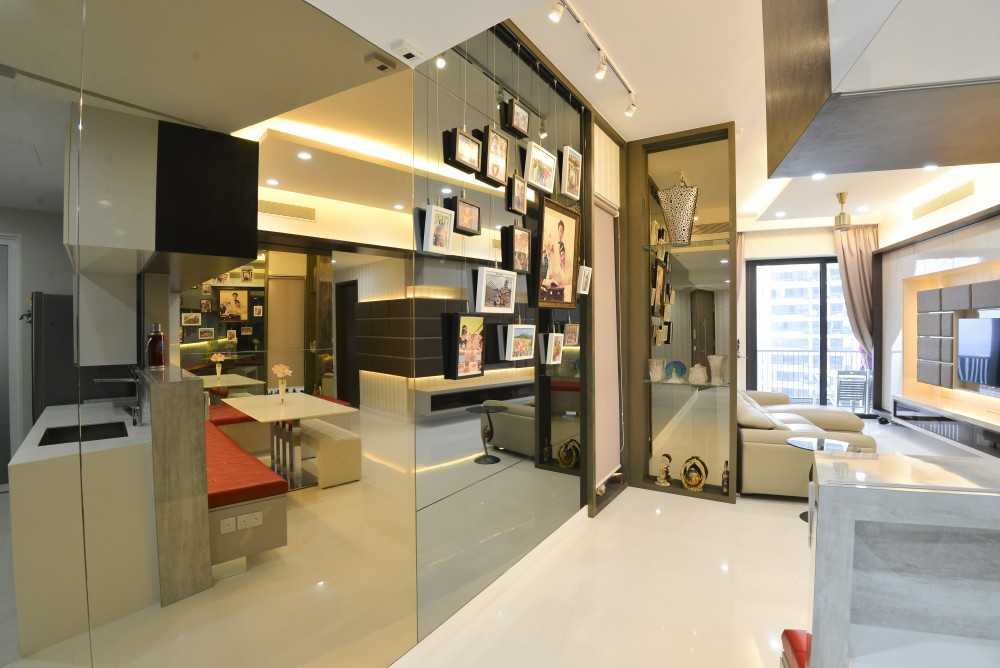 Modern Living Room with Bookshelf and Homogeneous Tiles