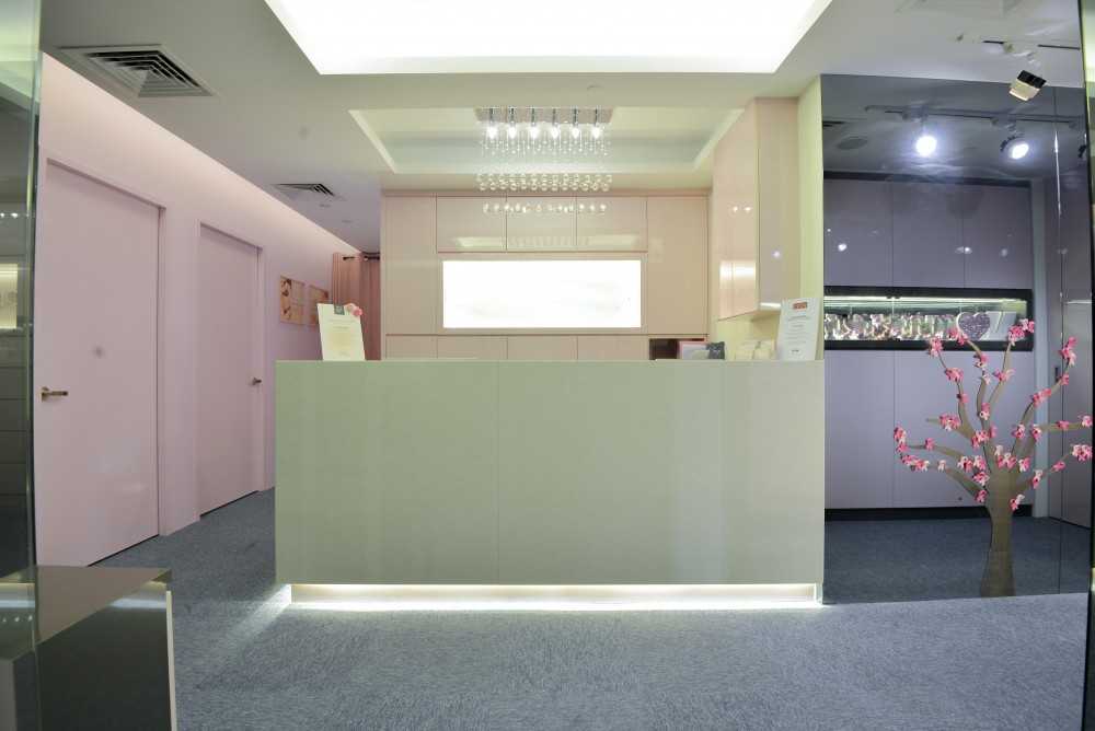 Contemporary Foyer with Drop Light and Artwork