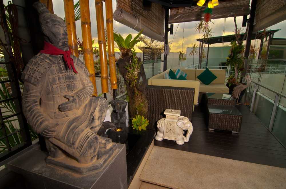 Asian Outdoor with Wood Flooring and Outdoor Table