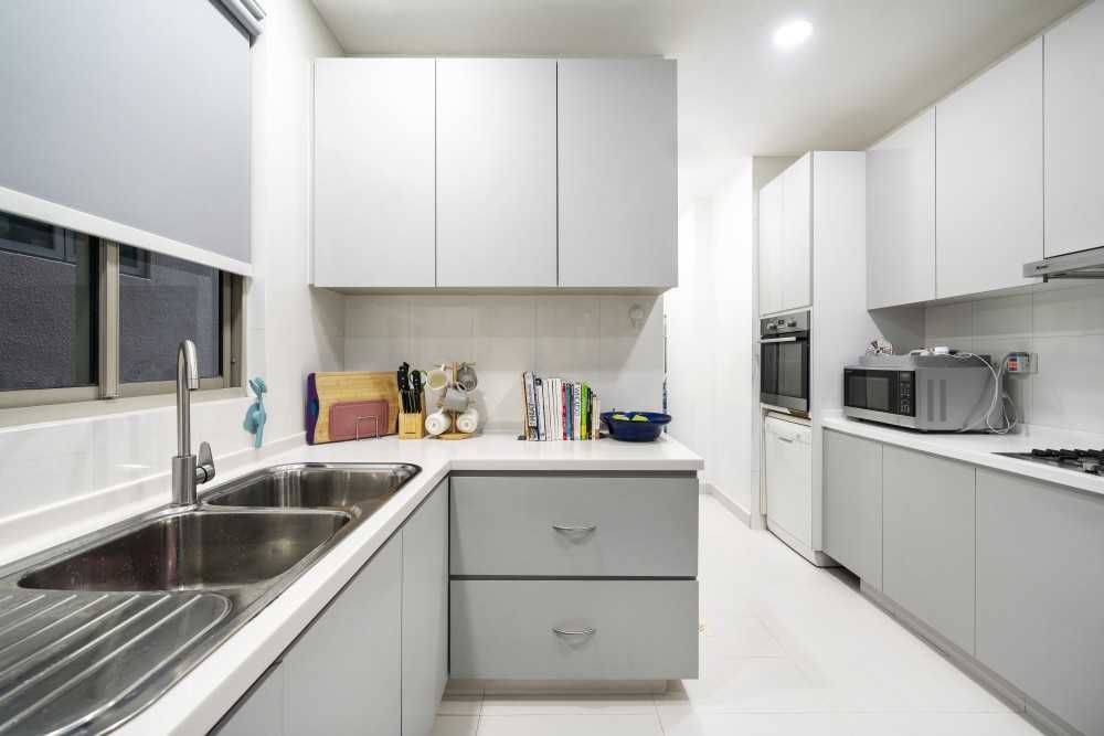 Modern Kitchen with Homogeneous Tiles and Kitchen Tap