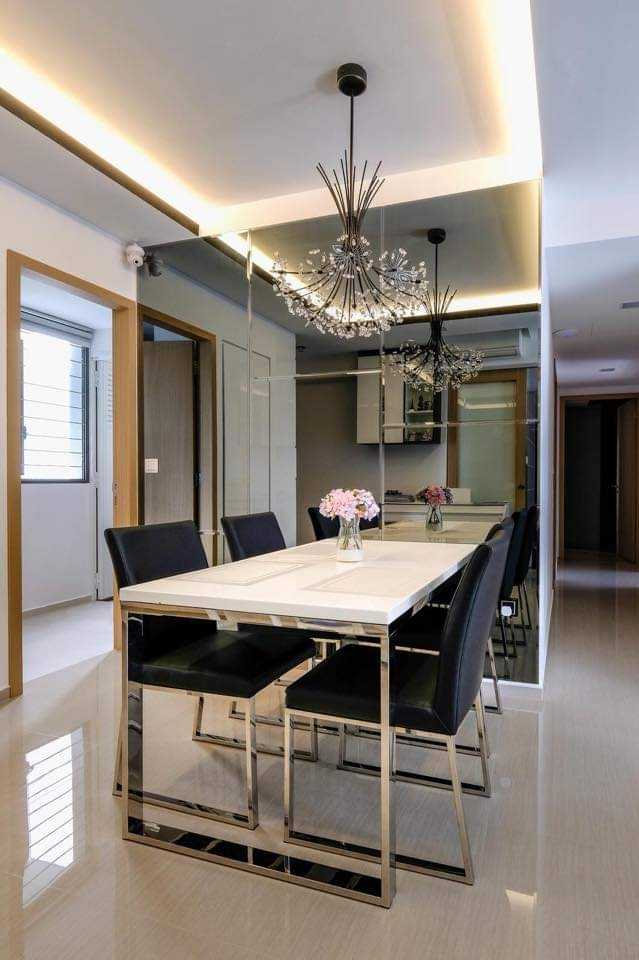Modern Dining Room with Mirror and Cove Lighting