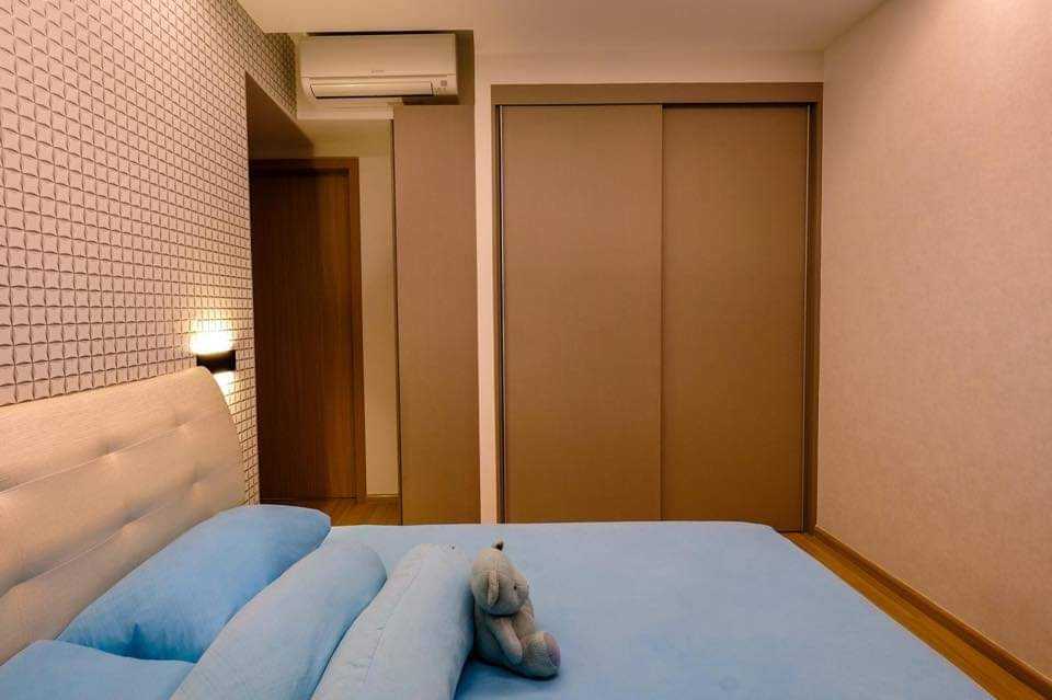 Modern Bedroom with Parquet Floor and Cove Lighting