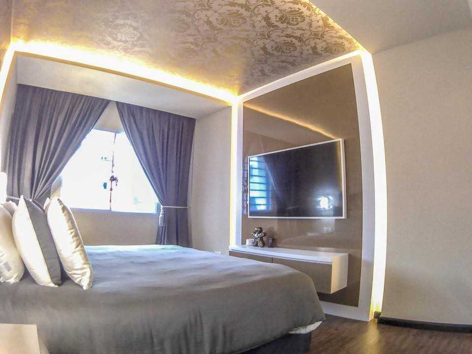 Modern Bedroom with Vinyl Flooring and Cove Lighting