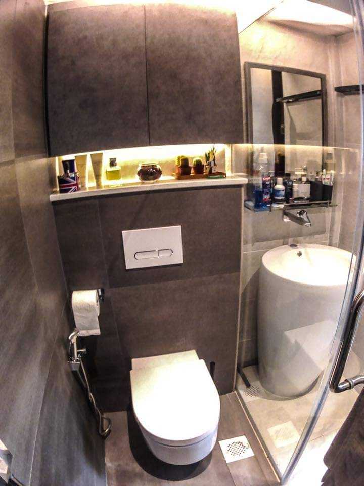 Industrial Bathroom with Countertop and Homogeneous Tiles