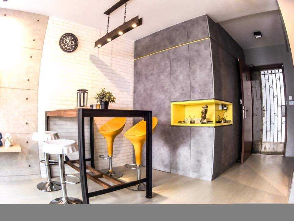 Industrial Dining Room with Drop Light and Dining Table