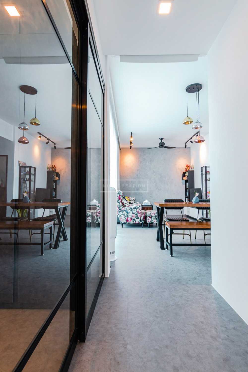 Industrial Hallway with Bookshelf and Dining Table