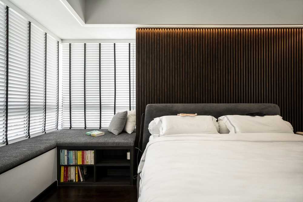 Modern Bedroom with Bookshelf and Wood Flooring