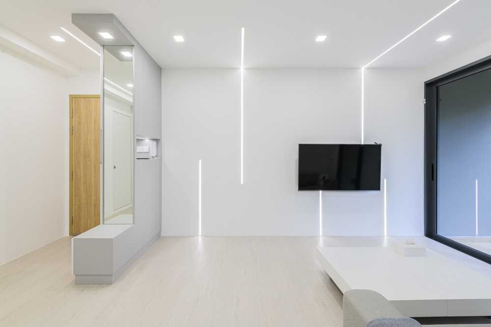 Modern Living Room with Vinyl Flooring and Feature Wall