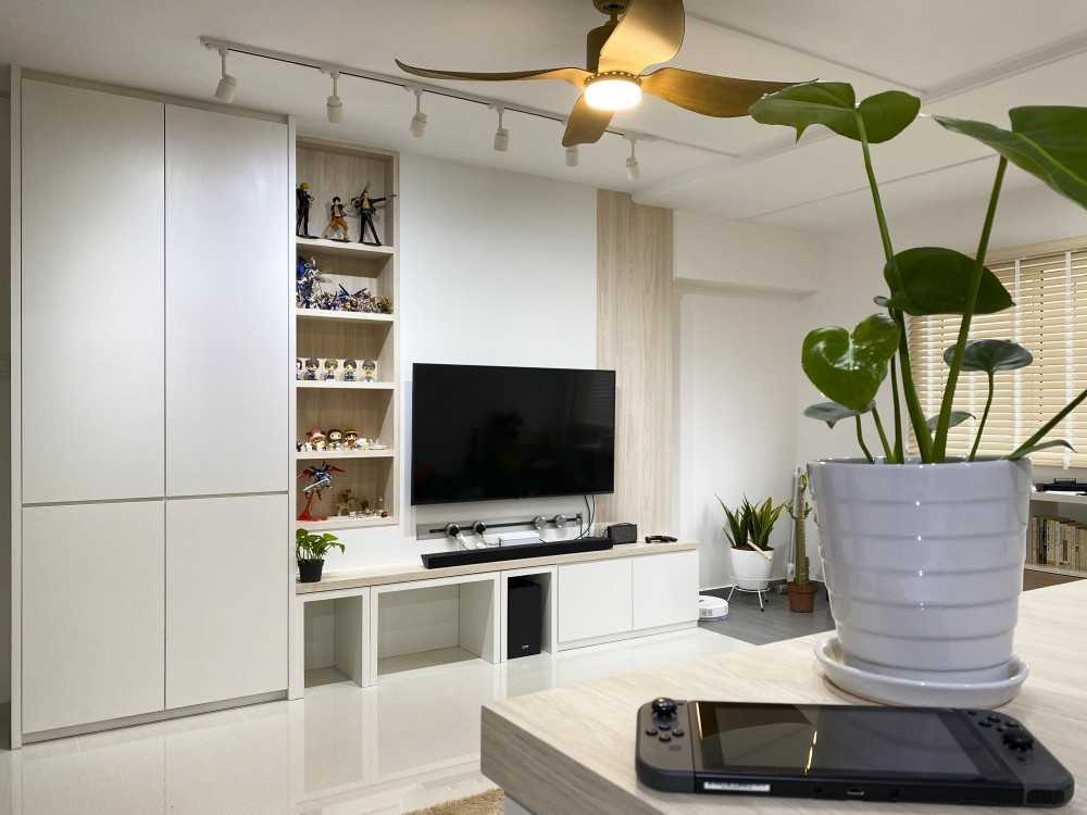 Scandinavian Living Room with Homogeneous Tiles and TV Console