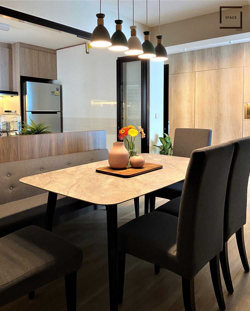 Contemporary Dining Room with Drop Light and Dining Table